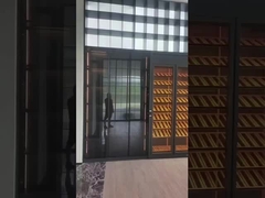 Armoire à vin en acier inoxydable avec rangement et sièges en noir élégant